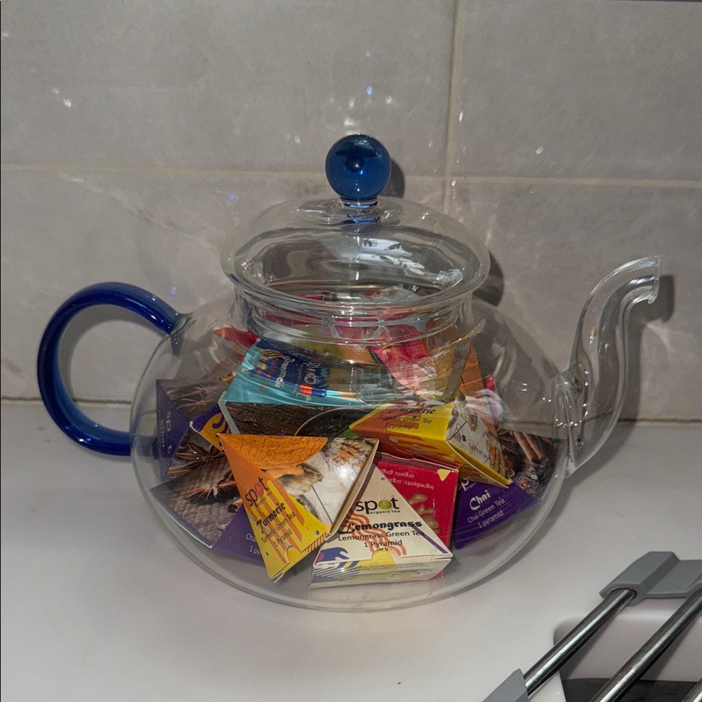 Glass Teapot with Blue Handle and Lid